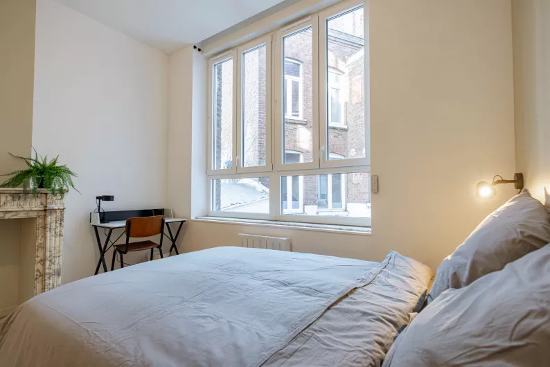 Chambre avec salle de bain partagée